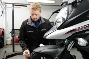 Mark at Winton Motorcycles completing a WOF